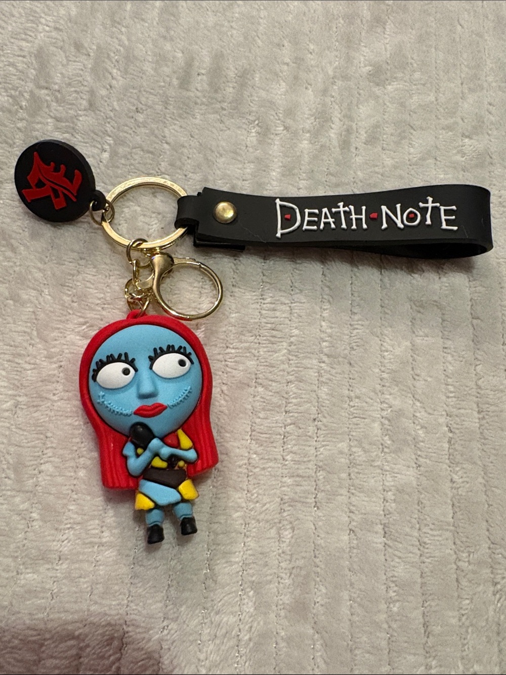 Death Note Black Strap Keychain with Red-Headed Character Charm